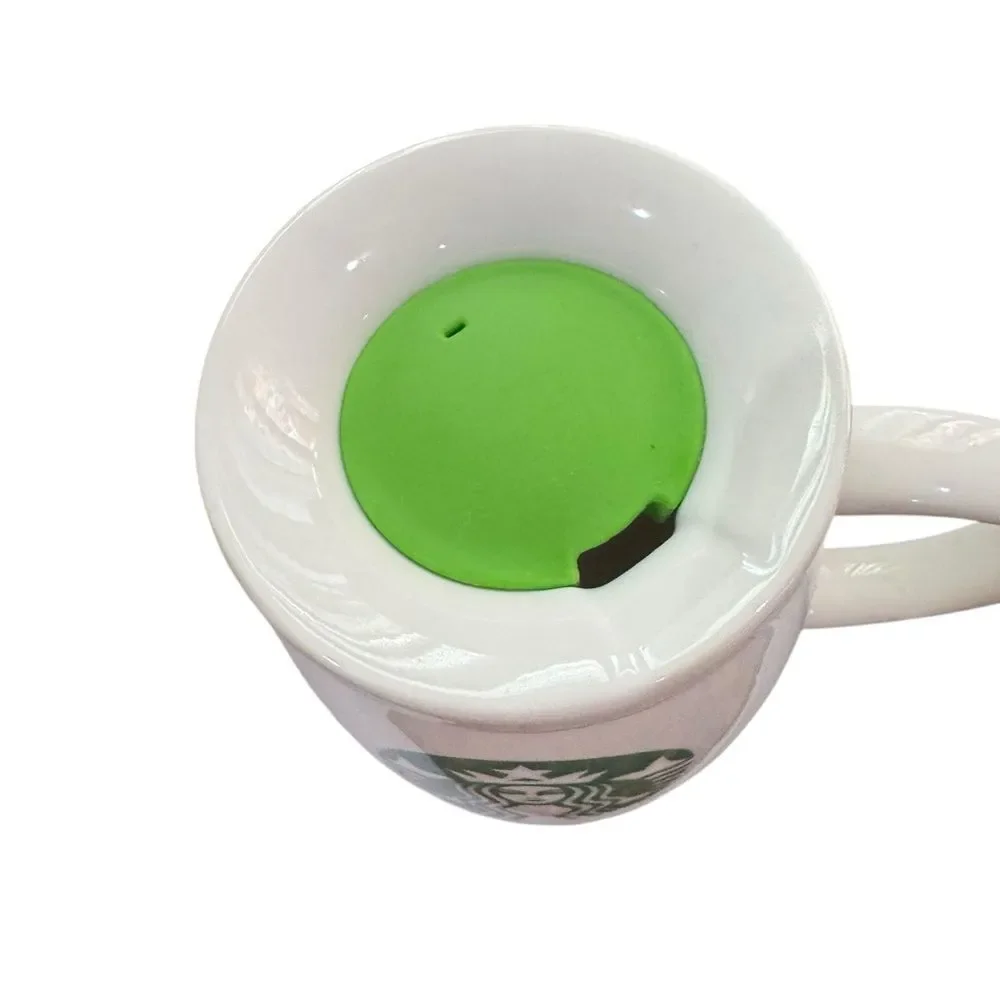 Starbucks 2011 White Ceramic Travel Mug with Green Logo